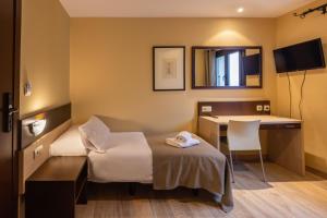 TV a/nebo společenská místnost v ubytování Hotel Port 1730