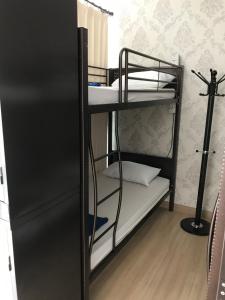 Postel nebo postele na pokoji v ubytování Island Hostel Bayan Lepas Airport