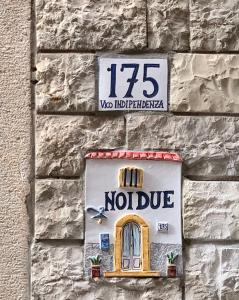 Πιστοποιητικό, βραβείο, πινακίδα ή έγγραφο που προβάλλεται στο Noi Due