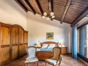 Säng eller sängar i ett rum på Villa Rosaria Rooms