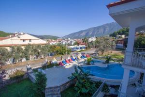 arial view of a resort with a swimming pool at Infinity Olympia Apartments in Oludeniz