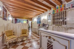 Kuchyň nebo kuchyňský kout v ubytování Hotel Bernardi Semenzato
