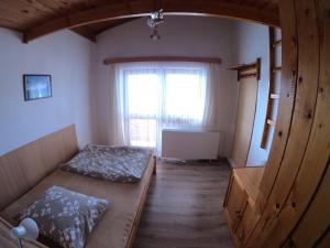 Katil atau katil-katil dalam bilik di Apartmán U Sjezdovky