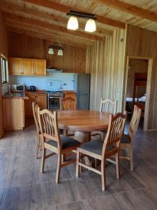 Kuchyň nebo kuchyňský kout v ubytování Paraíso Liumalla Lodge