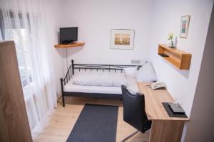 Een bed of bedden in een kamer bij Römerhof