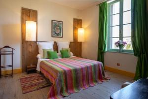 Säng eller sängar i ett rum på Villa Limonade, maison d'hotes