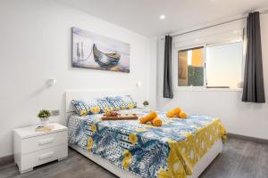 En eller flere senge i et værelse på 22 Casablanca II Veronica + 43 billeder