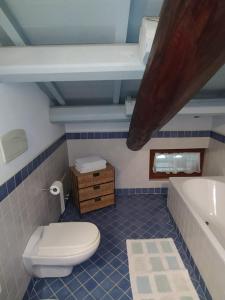 Koupelna v ubytování Tenuta Le Risare