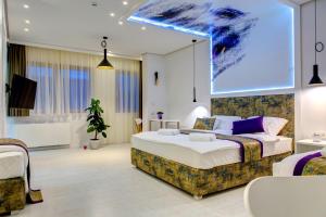 Ένα ή περισσότερα κρεβάτια σε δωμάτιο στο Diamond Rain Boutique Hotel