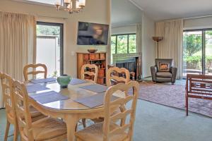 a dining room and living room with a table and chairs at Sunny Escape on Golf Course with Patio Near Wineries in Napa