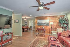 a living room with a couch and a ceiling fan at Glen Rose Ranch House - Walk to Downtown! in Glen Rose