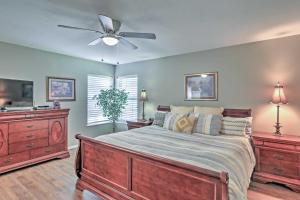 a bedroom with a bed and a ceiling fan at Glen Rose Ranch House - Walk to Downtown! in Glen Rose