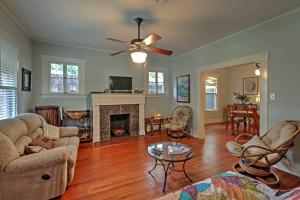 a living room filled with furniture and a fireplace at Quaint Houston Hideaway with Yard Less Than 3 Mi to Downtown in Houston