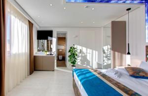 Kuchyň nebo kuchyňský kout v ubytování Diamond Rain Boutique Hotel