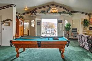 a living room with a pool table in it at Sunny La Verkin Studio - 20 Mi to Zion Natl Park! in La Verkin