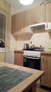 Kuchyňa alebo kuchynka v ubytovaní Best Apartment Naukova