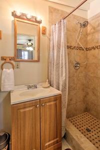 a bathroom with a sink and a shower at Renovated Tucson Gomez Casita with Yard Less Than 7 Mi to DT in Tucson +16 photos