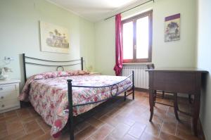Letto o letti in una camera di Casa Cardarella