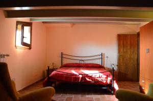 Letto o letti in una camera di Casa Cardarella