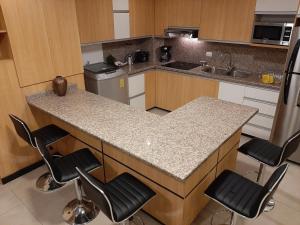 Dapur atau dapur kecil di Condominio La Victoria, Departamento en Cuenca 1 +10 gambar