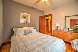 A bed or beds in a room at 1942 Train House Walk to CMU, River and Downtown!