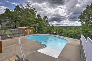 a large swimming pool on top of a house at Branson Condo with Views 2 Mi to Silver Dollar City in Branson West