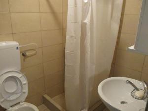 Um banheiro em Guesthouse Borovi