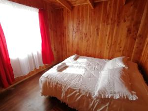 Postel nebo postele na pokoji v ubytování Hotel Catripulli