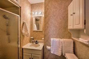 a small bathroom with a sink and a mirror at 11 Mi to Hersheypark Family Home in Harrisburg in Harrisburg +36 photos