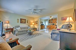 a living room with a couch and a tv at Charming Owls Head Retreat 2 Mi to Rockland Coast in Owls Head