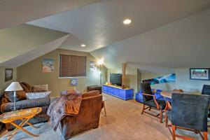 a living room with a couch and a bed at Bozeman Getaway with Mountain Views, Near Downtown in Bozeman