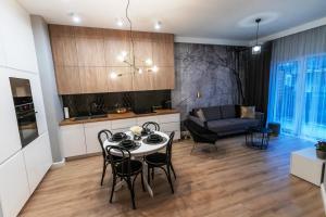Posedenie v ubytovaní Apartament 56