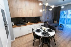 Kuchyňa alebo kuchynka v ubytovaní Apartament 56
