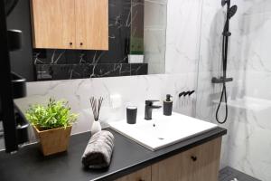 Kúpeľňa v ubytovaní Apartament 56
