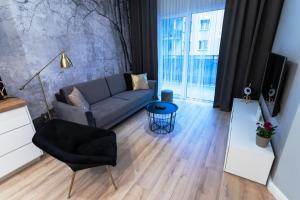 Posedenie v ubytovaní Apartament 56