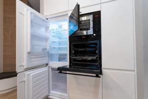 Kuchyňa alebo kuchynka v ubytovaní Apartament 56