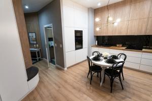 Kuchyňa alebo kuchynka v ubytovaní Apartament 56