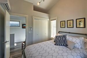 A bed or beds in a room at Missoula Getaway with Balcony, 2 Mi to Downtown!