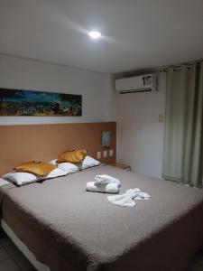 Voodi või voodid majutusasutuse Pipa´s Ocean Flat toas