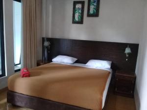 Voodi või voodid majutusasutuse RF Hotel toas
