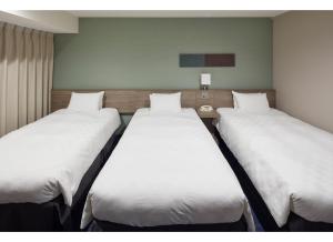 Postel nebo postele na pokoji v ubytování Sunshine City Prince Hotel Ikebukuro Tokyo