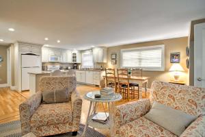 a living room with a couch and a table at Lovely Kennebunk Guesthouse - 2 Mi to Dock Square! in Kennebunk