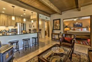 a living room with a kitchen and a bedroom at Adobe-Style Abode with Amenities - Walk to Plaza! in Santa Fe