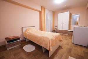 Кровать или кровати в номере Hotel Aeroport Krasnoyarsk