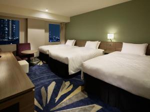 Postel nebo postele na pokoji v ubytování Sunshine City Prince Hotel Ikebukuro Tokyo
