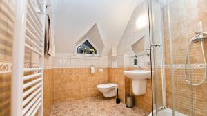 Koupelna v ubytování Apartmány Pod Čerťákem