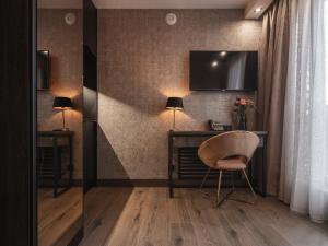 Televízia a/alebo spoločenská miestnosť v ubytovaní Art Suites Boutique Hotel - Krakow Center