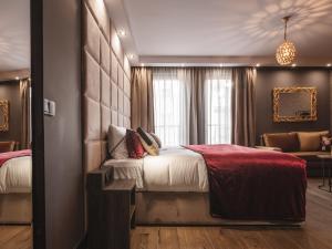 Posteľ alebo postele v izbe v ubytovaní Art Suites Boutique Hotel - Krakow Center