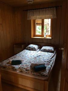 Ліжко або ліжка в номері Domek Malinka 13