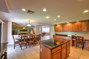 A restaurant or other place to eat at Spacious Litchfield Park Home with Yard, Heated Pool